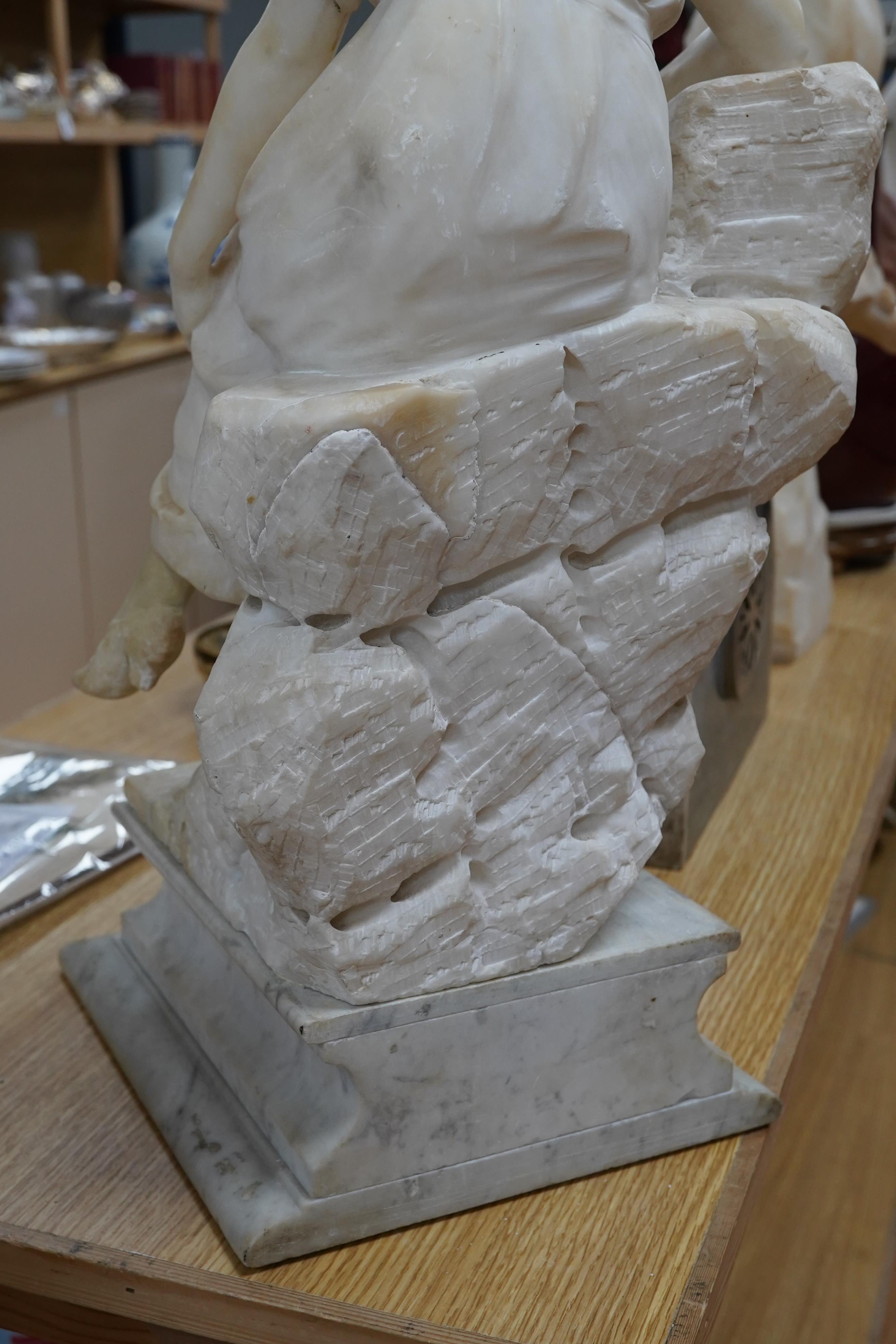 A French 1920’s-30’s alabaster sculpture of a lady seated on a stone wall, sculpture mounted on a marble stand, 63cm high. Condition - crack to alabaster at the front and discoloured restoration